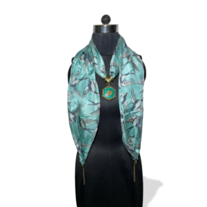 Teal stole with flying bird print and turquoise starburst pendant