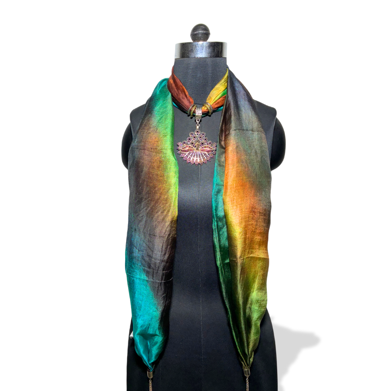 Ombre stole in jewel tones with lotus-inspired fan pendant